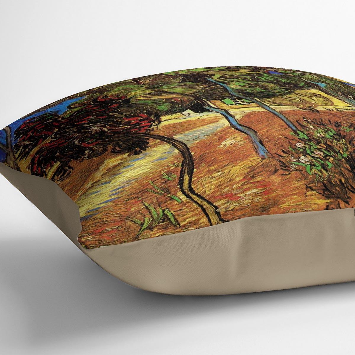 A vibrant cushion featuring the Trees in the Garden of Saint-Paul Hospital 2 by Van Gogh, made from luxurious vegan faux suede with plump filling.