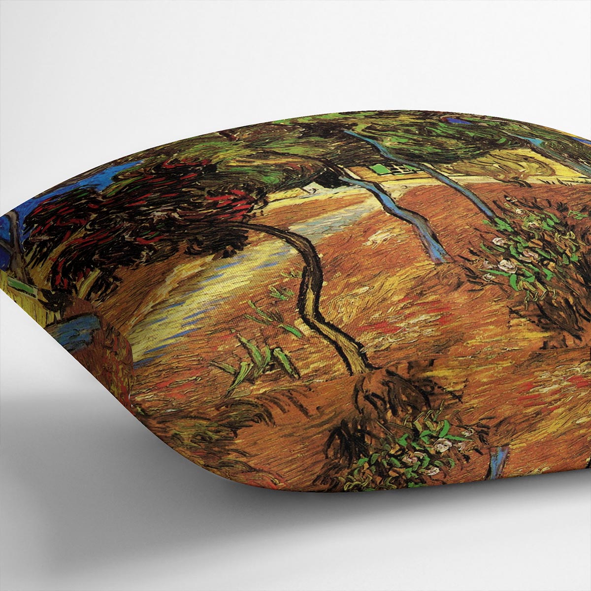A vibrant cushion featuring the Trees in the Garden of Saint-Paul Hospital 2 by Van Gogh, made from luxurious vegan faux suede with plump filling.