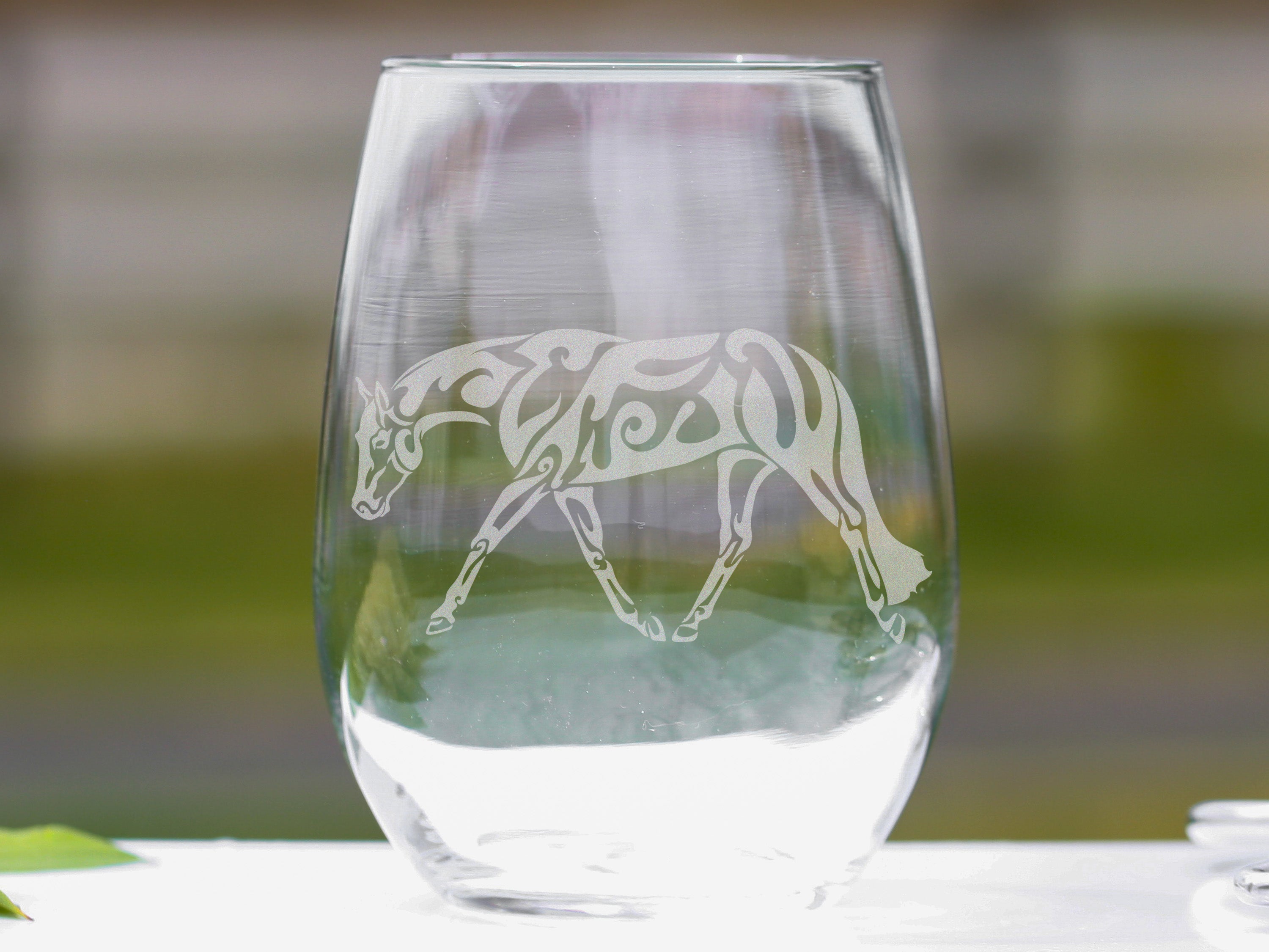 Set of Tribal Western Quarter Horse wine glasses featuring unique tribal designs, perfect for wine lovers and equestrian enthusiasts.