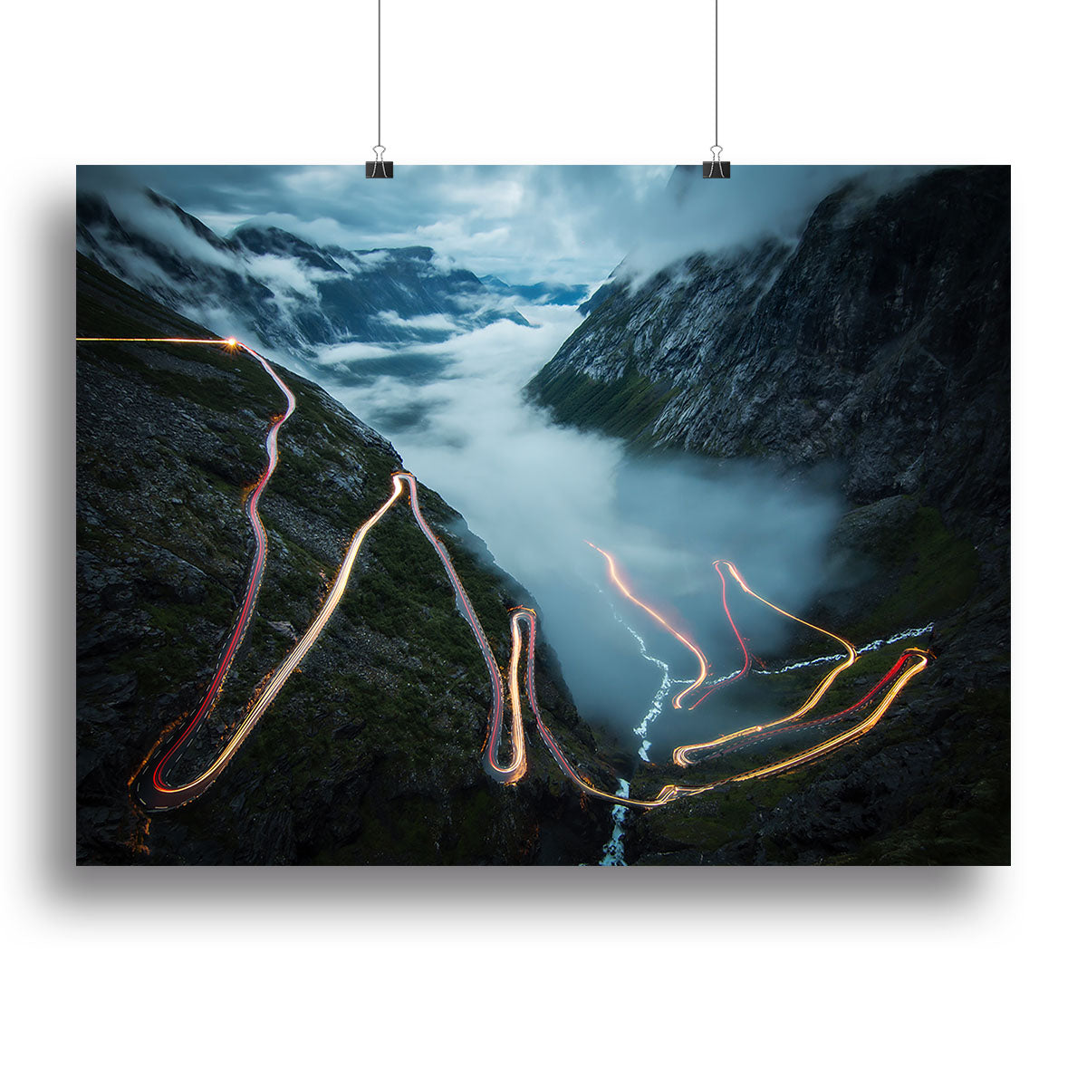 A beautiful Trollstigen canvas print showcasing Norway's scenic landscape with winding roads and lush greenery.