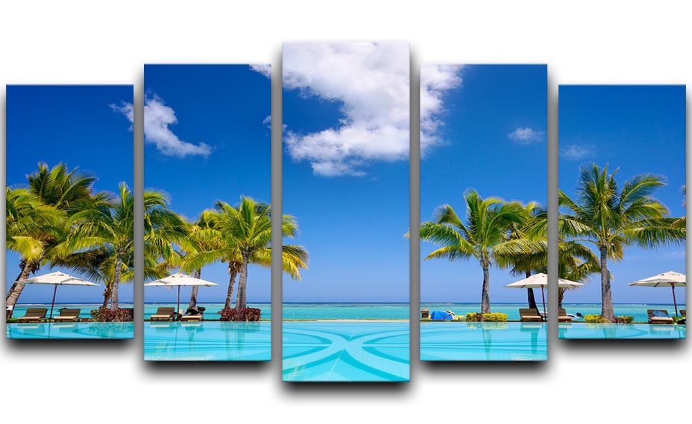 A stunning 5-panel canvas artwork depicting a tropical beach resort with lounge chairs, showcasing vibrant colors and serene scenery.