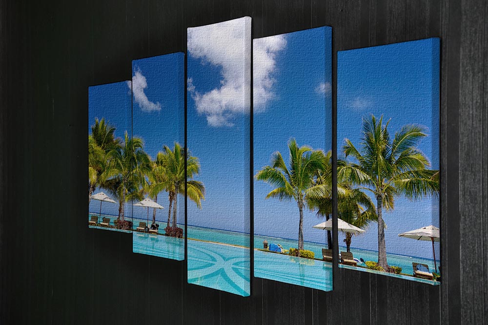 A stunning 5-panel canvas artwork depicting a tropical beach resort with lounge chairs, showcasing vibrant colors and serene scenery.