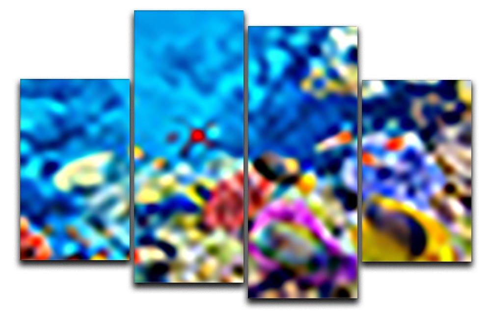 A vibrant 4-panel canvas artwork featuring colorful tropical fish, creating a dynamic ocean scene.