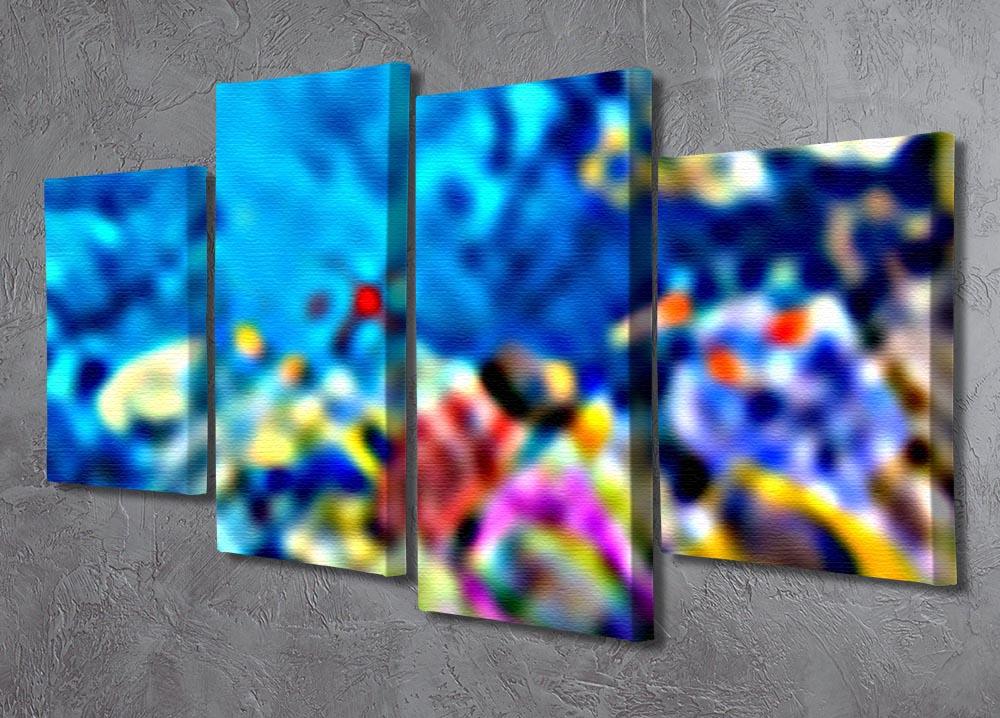 A vibrant 4-panel canvas artwork featuring colorful tropical fish, creating a dynamic ocean scene.
