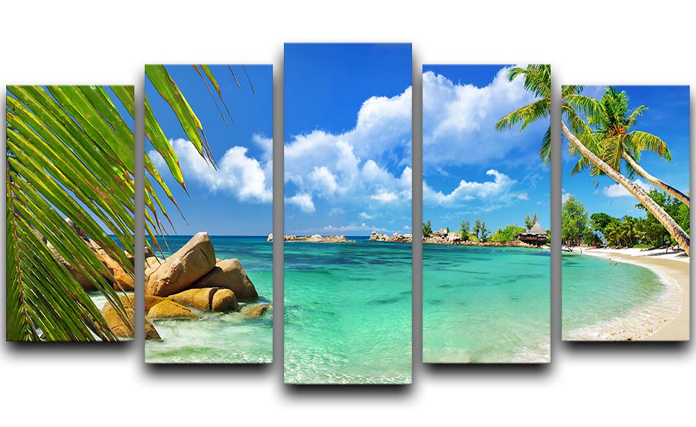 A vibrant 5-panel canvas artwork depicting a tropical paradise with lush greenery and serene beach scenery.