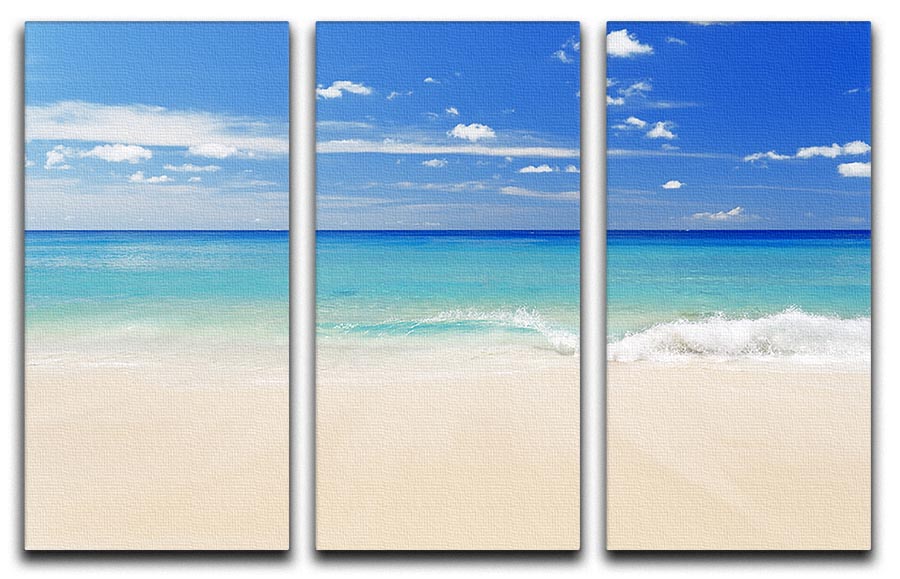 A beautiful 3-panel canvas print depicting a tropical white sand beach under a clear blue sky, perfect for home decor.