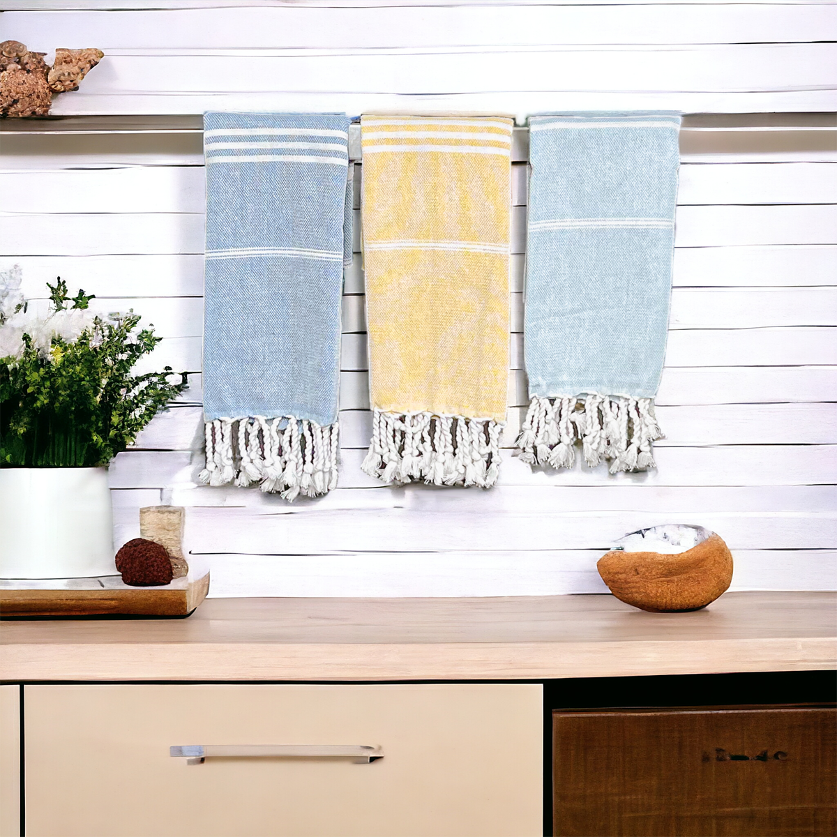 Luxurious oversized Turkish hand towel with bamboo tassels, showcasing vibrant colors and elegant design.