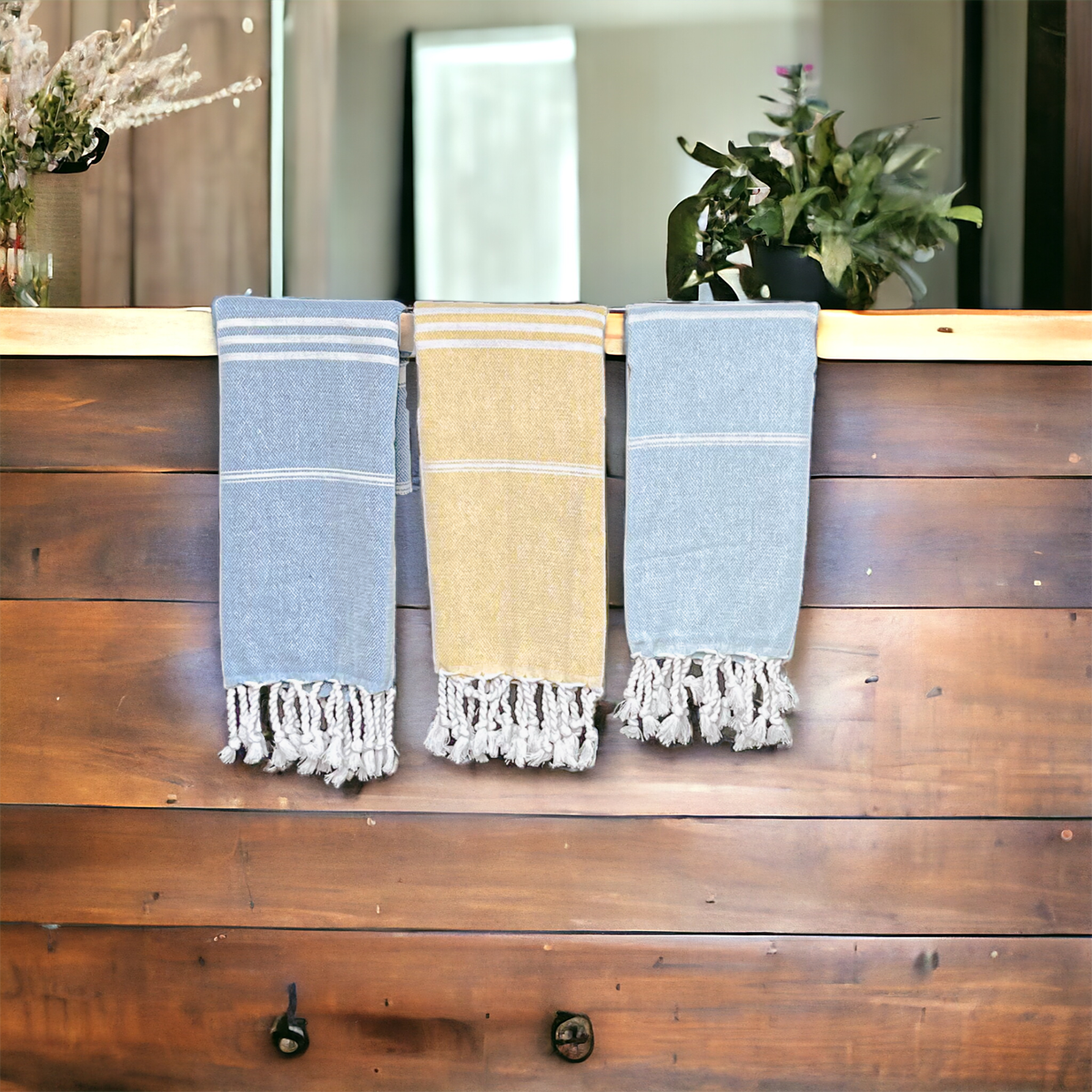 Luxurious oversized Turkish hand towel with bamboo tassels, showcasing vibrant colors and elegant design.