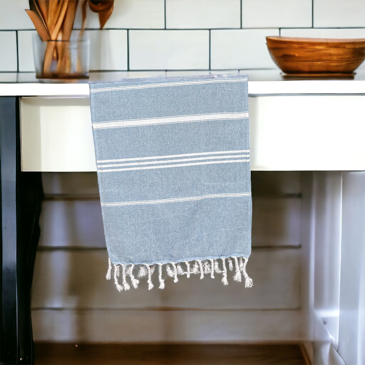 Luxurious oversized Turkish hand towel with bamboo tassels, showcasing vibrant colors and elegant design.
