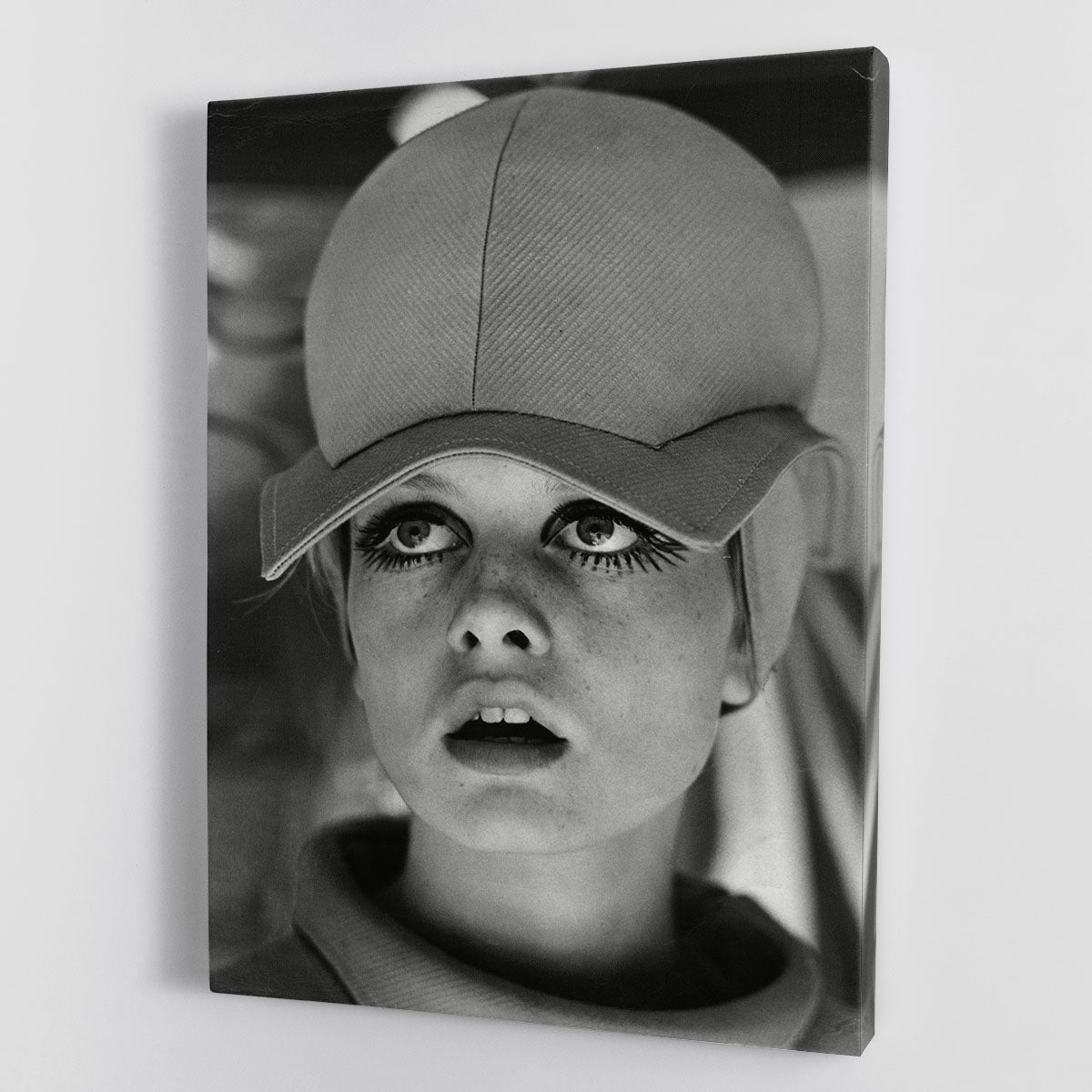 Canvas print of Twiggy in 1966, showcasing her iconic fashion style with vibrant colors and intricate details.
