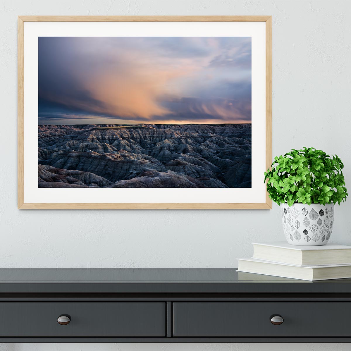 Twilight Over Badlands Framed Print showcasing vibrant colors and exquisite craftsmanship in a stylish frame.