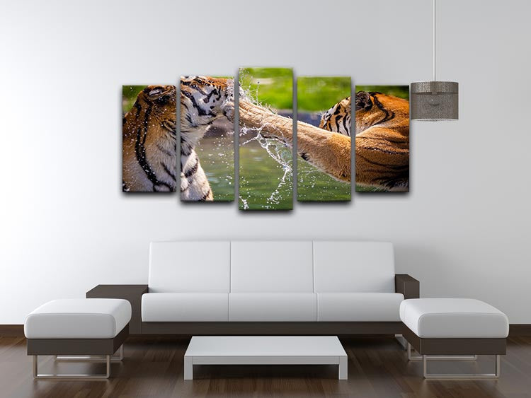 A vibrant 5-split panel canvas artwork featuring two adult tigers playfully splashing in water, showcasing their beauty and grace.