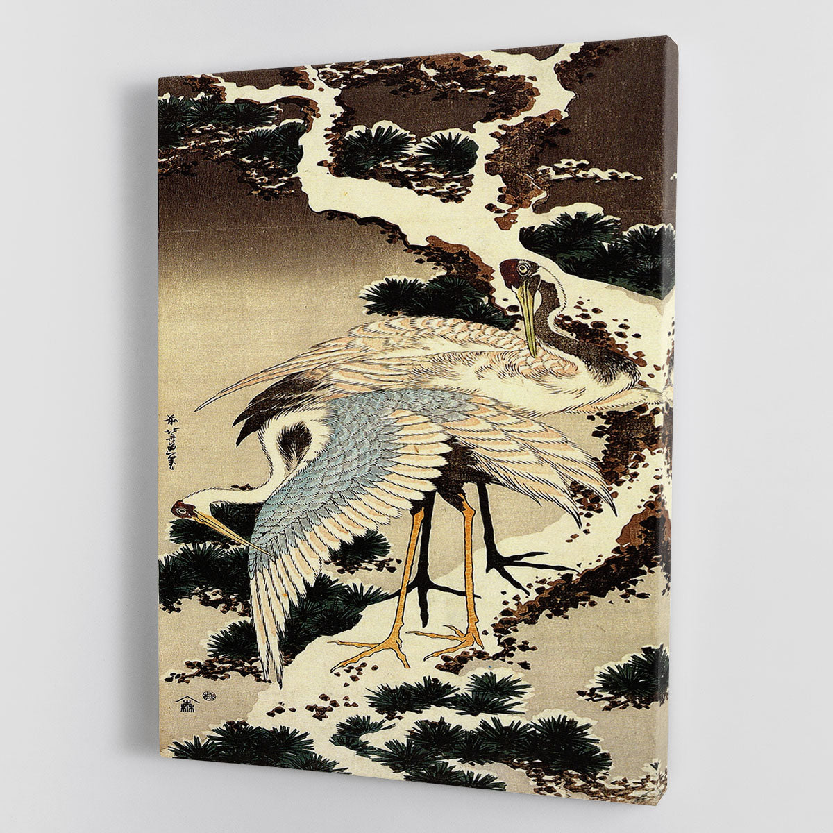 Canvas print of Hokusai's Two Cranes on a snow-covered pine tree, showcasing intricate details and vibrant colors.