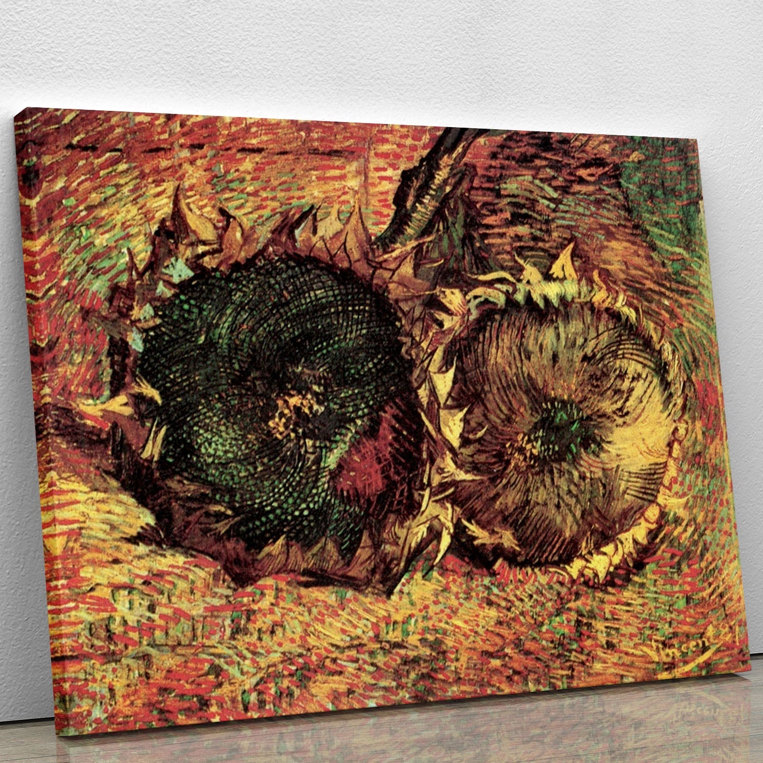 A vibrant canvas print of Van Gogh's Two Cut Sunflowers, showcasing bright yellow petals and rich green leaves, perfect for home decor.