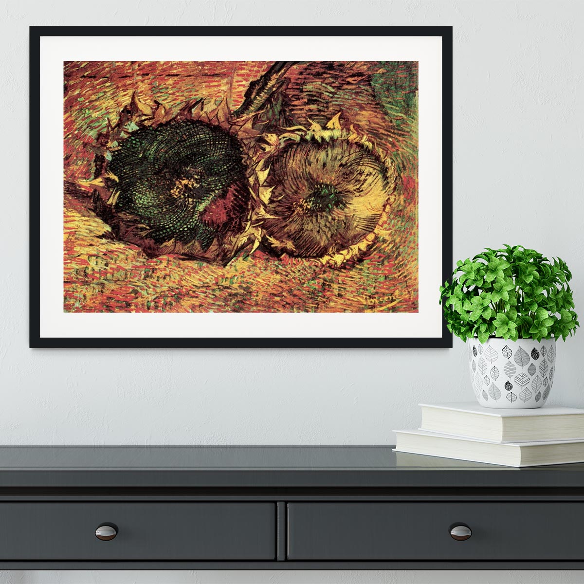 Framed print of Van Gogh's Two Cut Sunflowers, showcasing vibrant colors and intricate details in a stylish frame.