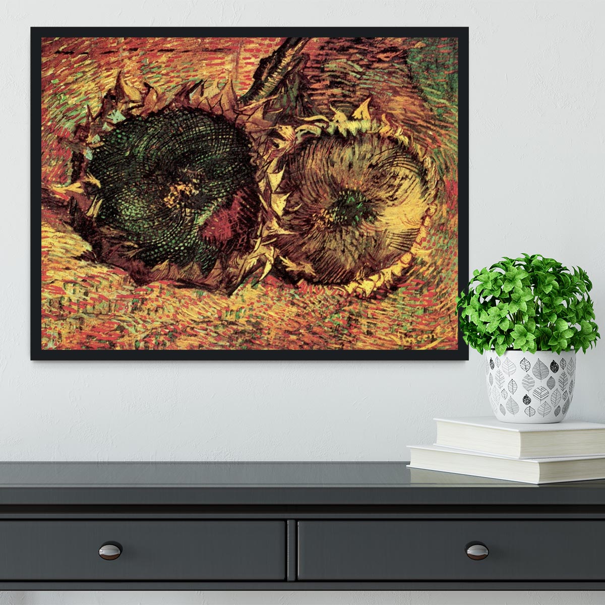 Framed print of Van Gogh's Two Cut Sunflowers, showcasing vibrant colors and intricate details in a stylish frame.