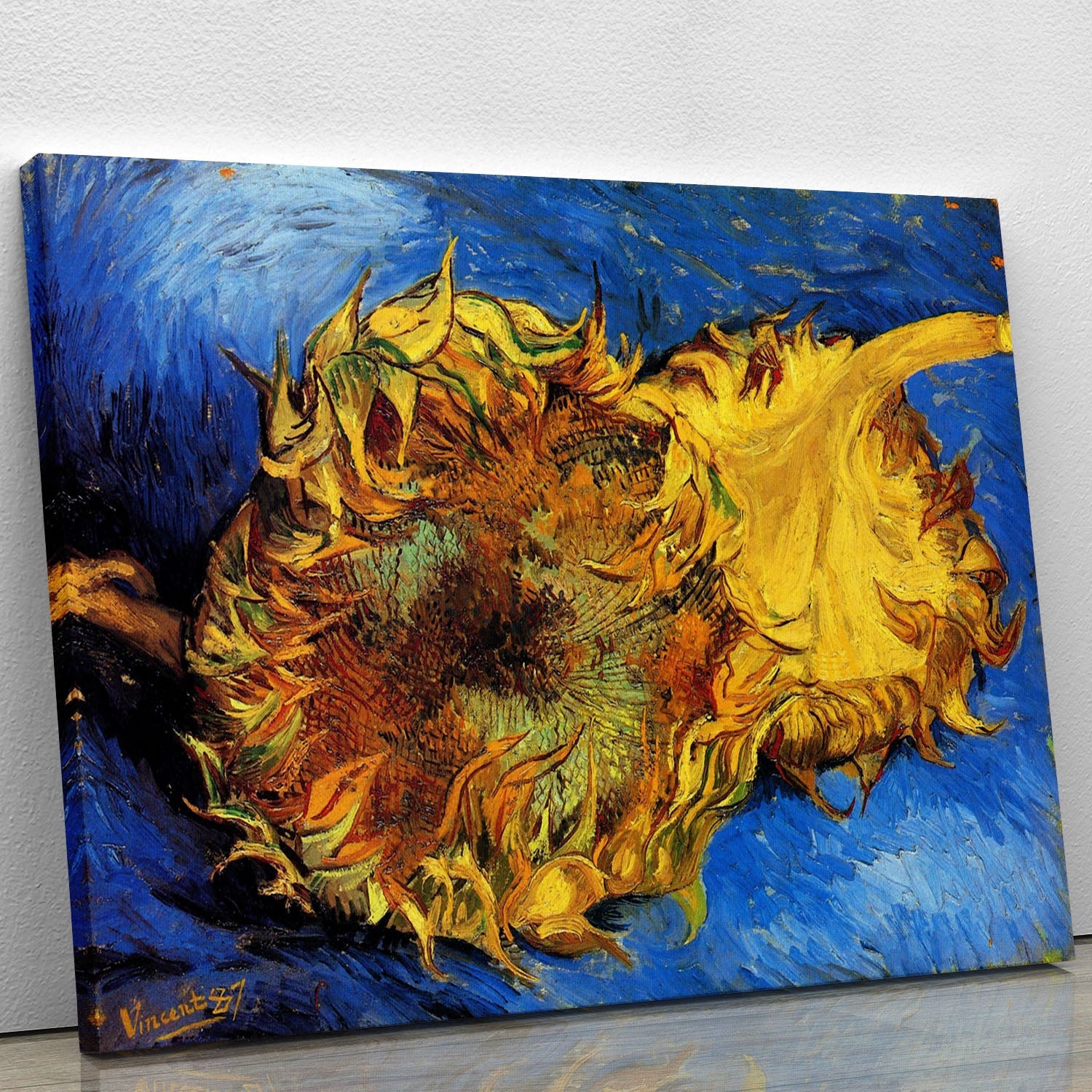 Canvas print of Van Gogh's Two Cut Sunflowers, showcasing vibrant yellow flowers against a textured background.