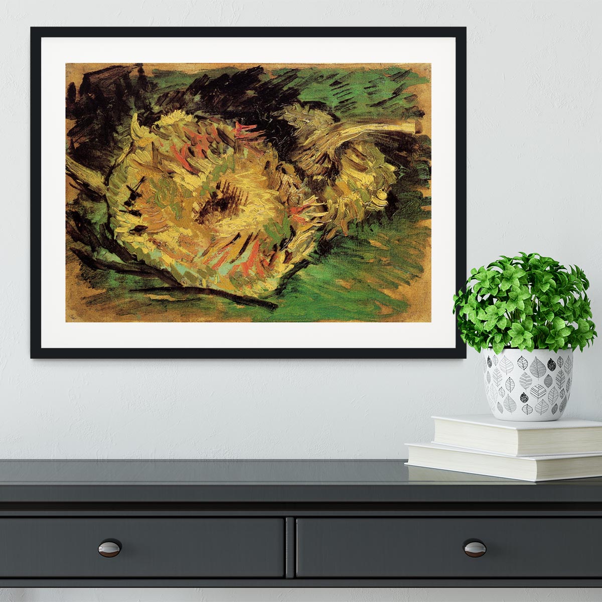 Framed print of Van Gogh's Two Cut Sunflowers, showcasing vibrant colors and quality craftsmanship in a stylish frame.