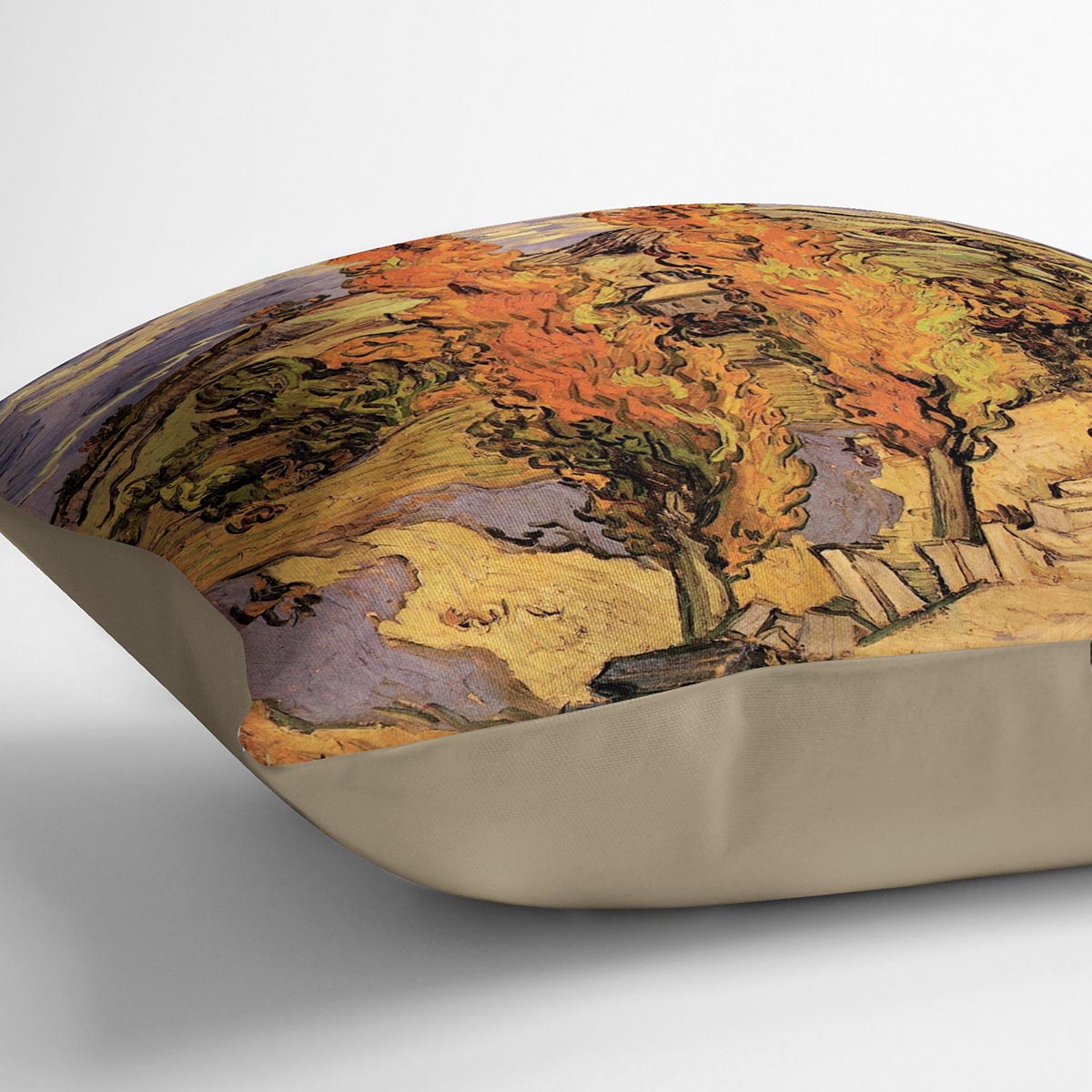 A vibrant cushion featuring Van Gogh's Two Poplars on a Road Through the Hills design, made from luxurious vegan faux suede.