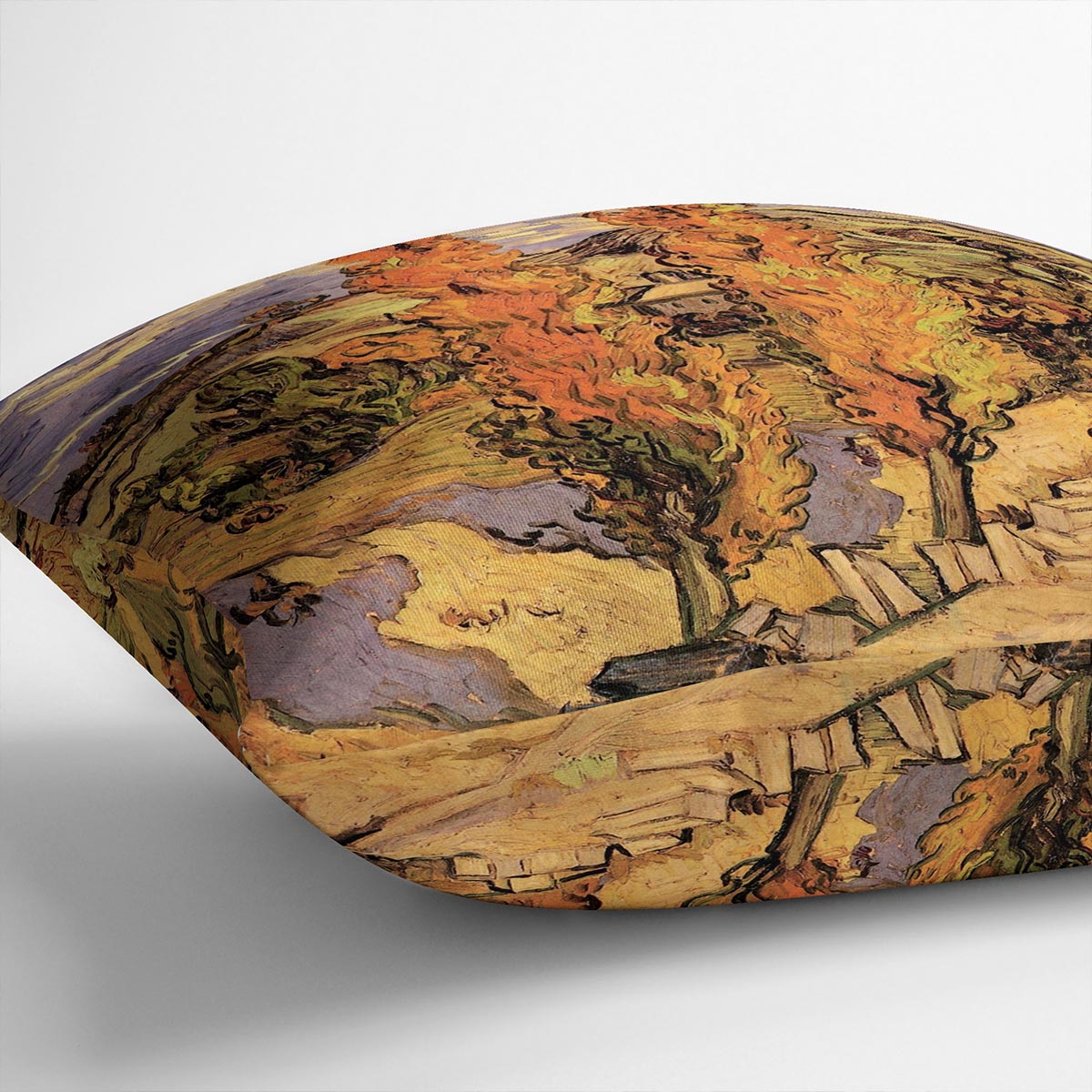 A vibrant cushion featuring Van Gogh's Two Poplars on a Road Through the Hills design, made from luxurious vegan faux suede.