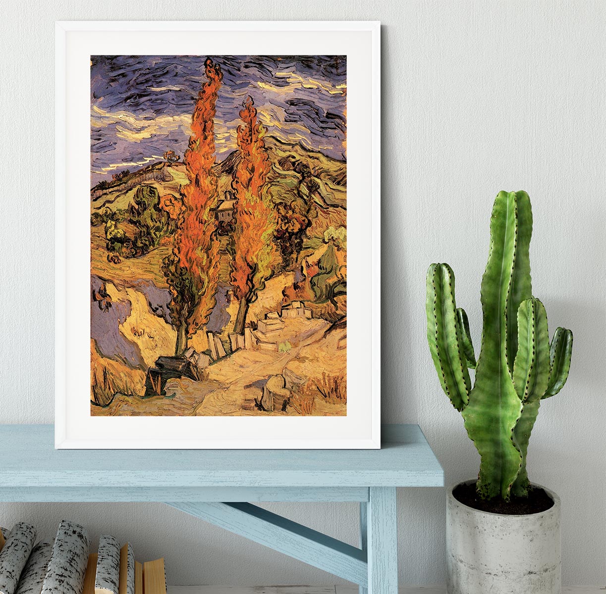 Framed print of Van Gogh's 'Two Poplars on a Road Through the Hills' showcasing vibrant colors and intricate details.