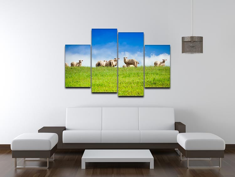 A beautiful 4-split canvas artwork featuring two sheep looking at the camera, surrounded by a herd, showcasing a serene and captivating scene.
