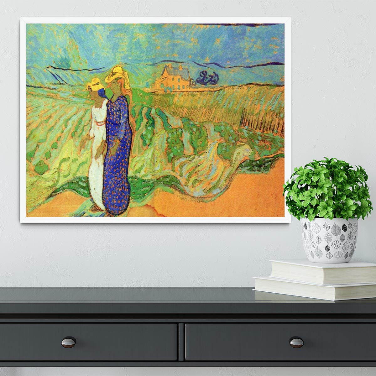 Framed print of Van Gogh's Two Women Crossing the Fields, showcasing vibrant colors and intricate details.
