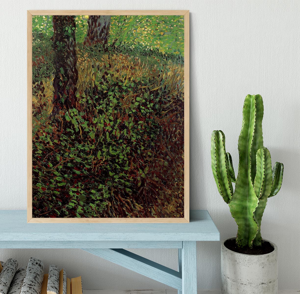 Framed print of Van Gogh's Undergrowth artwork, showcasing vibrant colors and intricate details in a handmade frame.