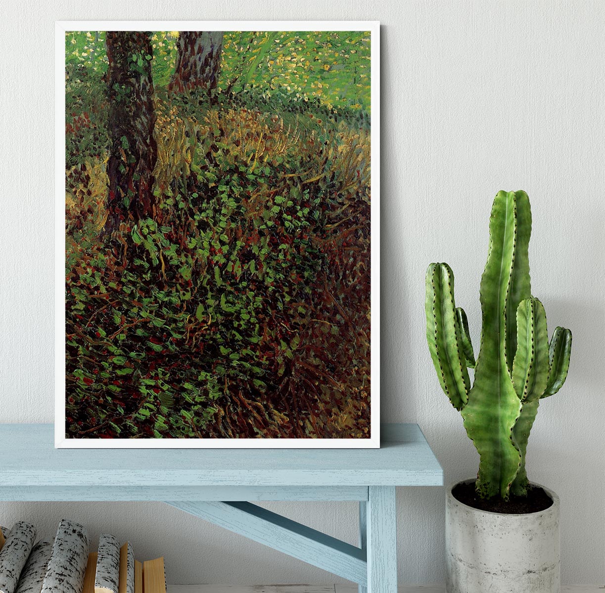 Framed print of Van Gogh's Undergrowth artwork, showcasing vibrant colors and intricate details in a handmade frame.