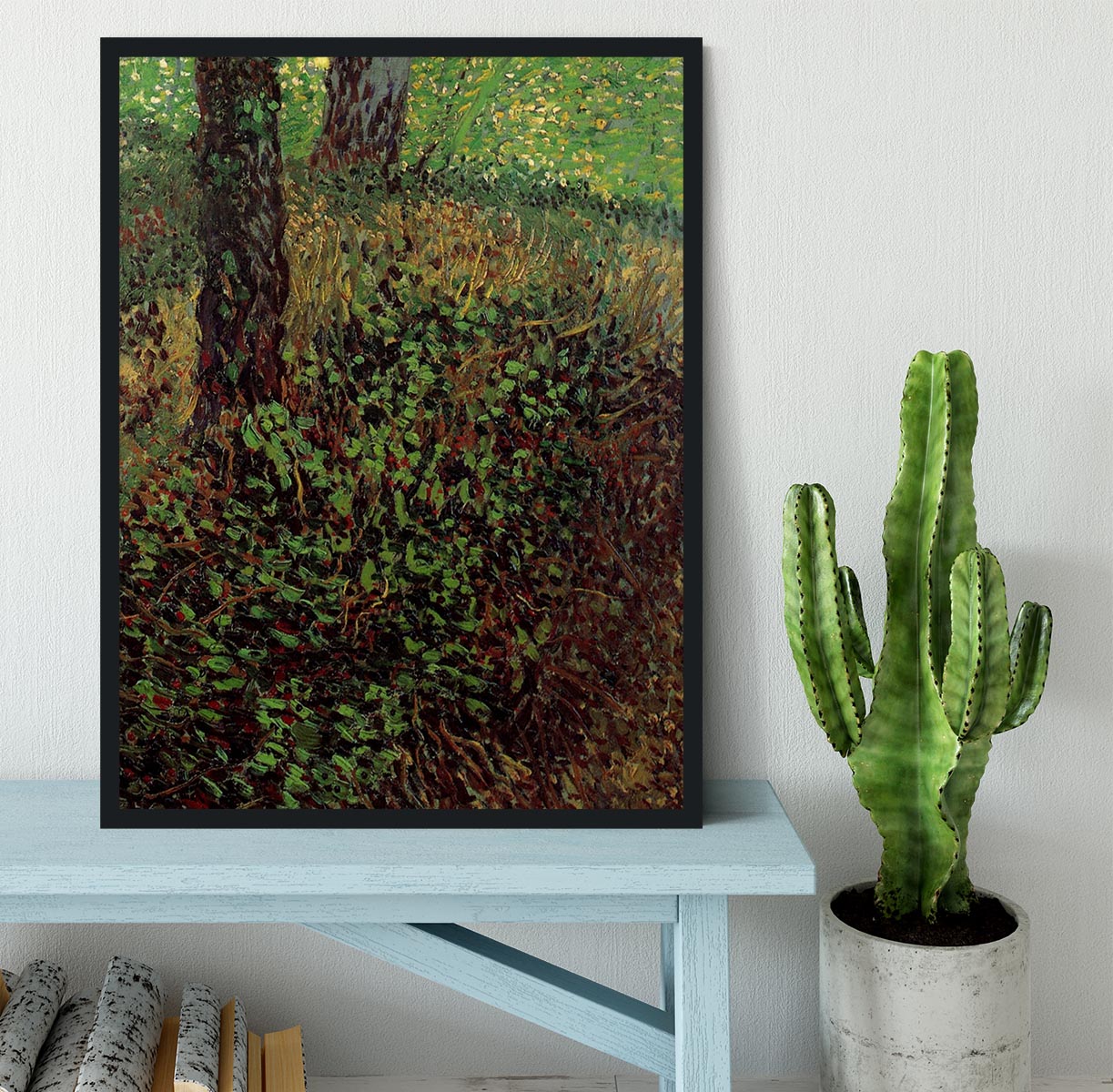 Framed print of Van Gogh's Undergrowth artwork, showcasing vibrant colors and intricate details in a handmade frame.