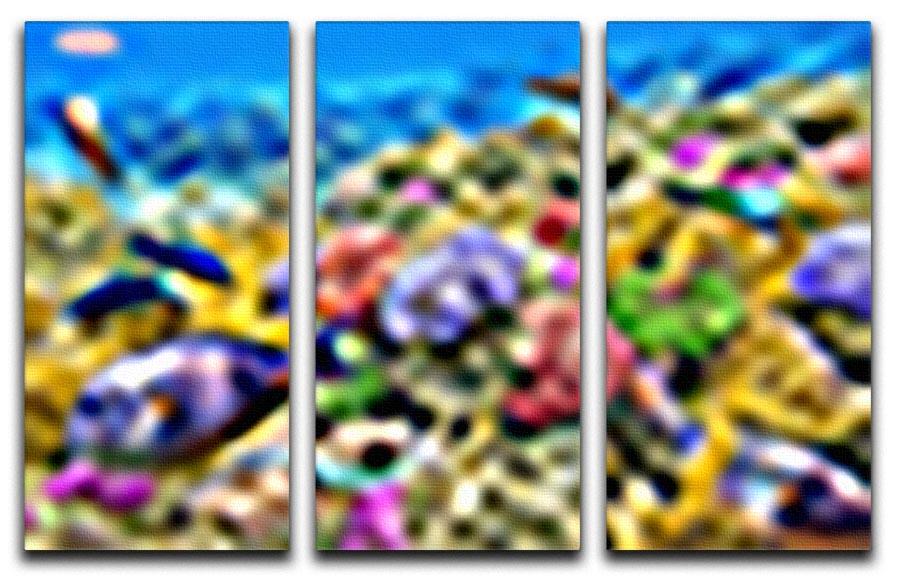 A vibrant 3-panel canvas artwork depicting an underwater world with colorful corals and tropical fish, perfect for home decor.