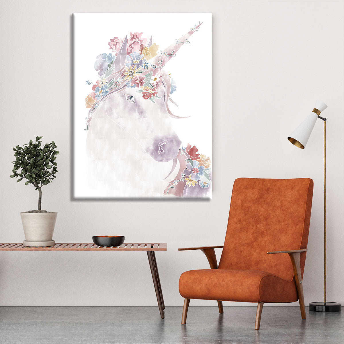 A vibrant unicorn surrounded by colorful flowers on a canvas print, perfect for home decor.