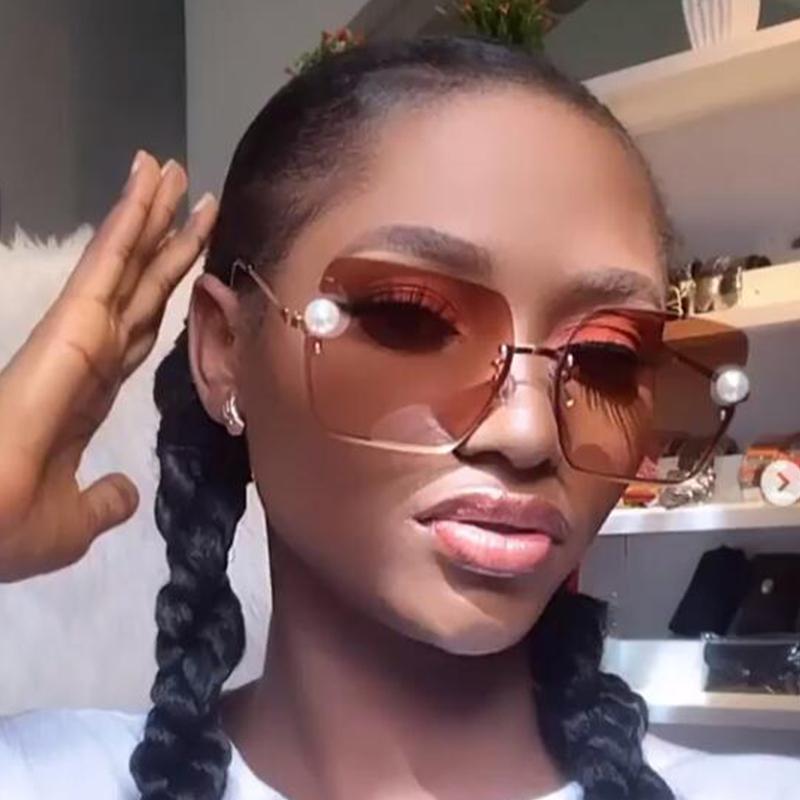 Unique Pearl Decoration Square Sunglasses for Women with brown rimless frame and stylish design.