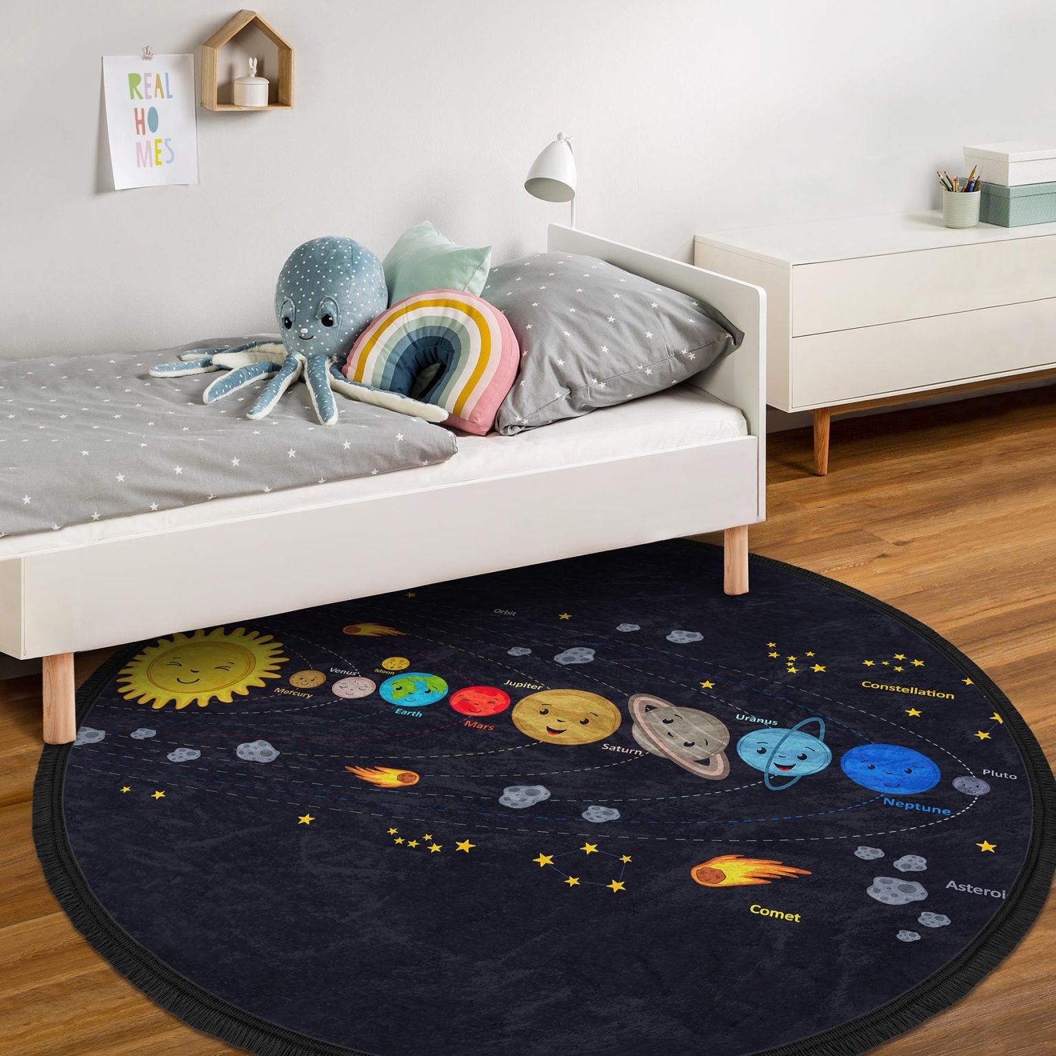 A colorful round rug featuring a vibrant universe design, perfect for kids' rooms and playrooms, made of soft velvet fabric with fringes.