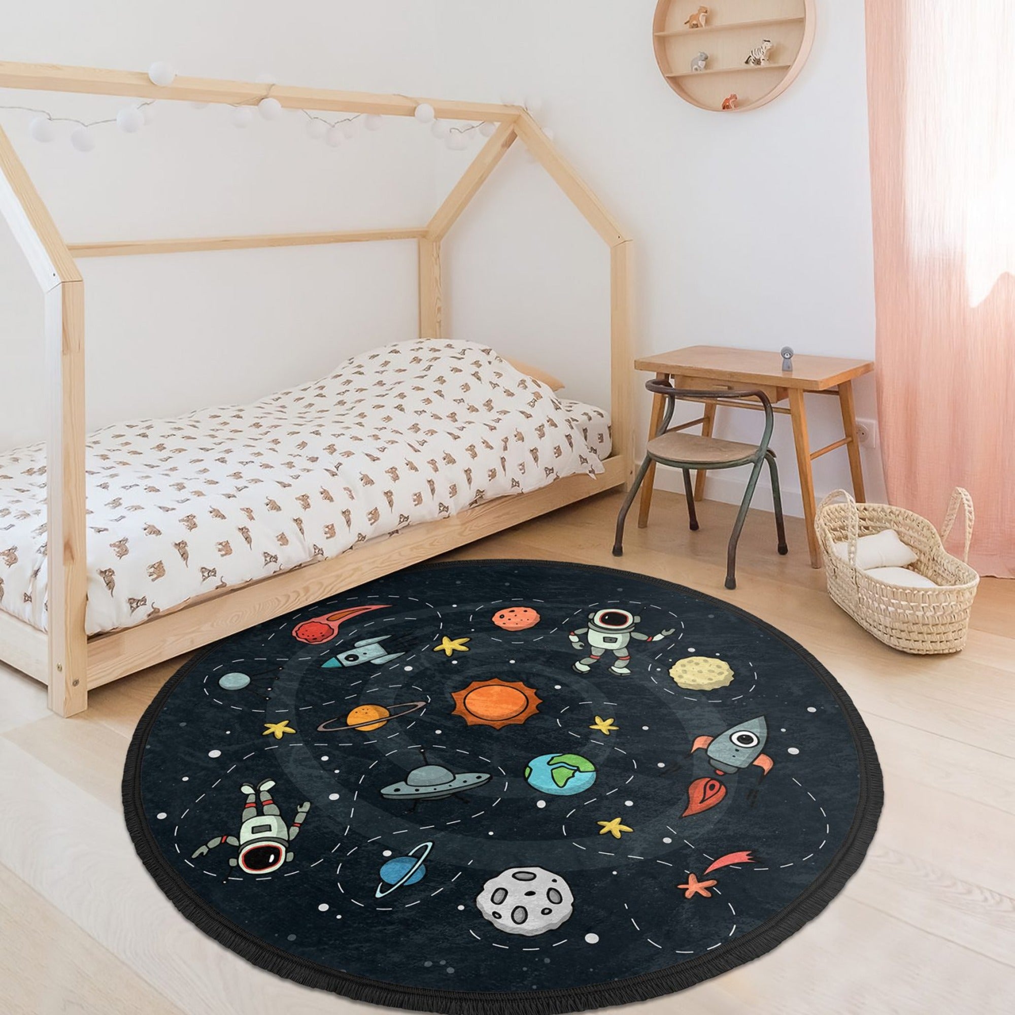 A vibrant universe patterned kids room rug featuring a colorful celestial design, perfect for nurseries and play areas.