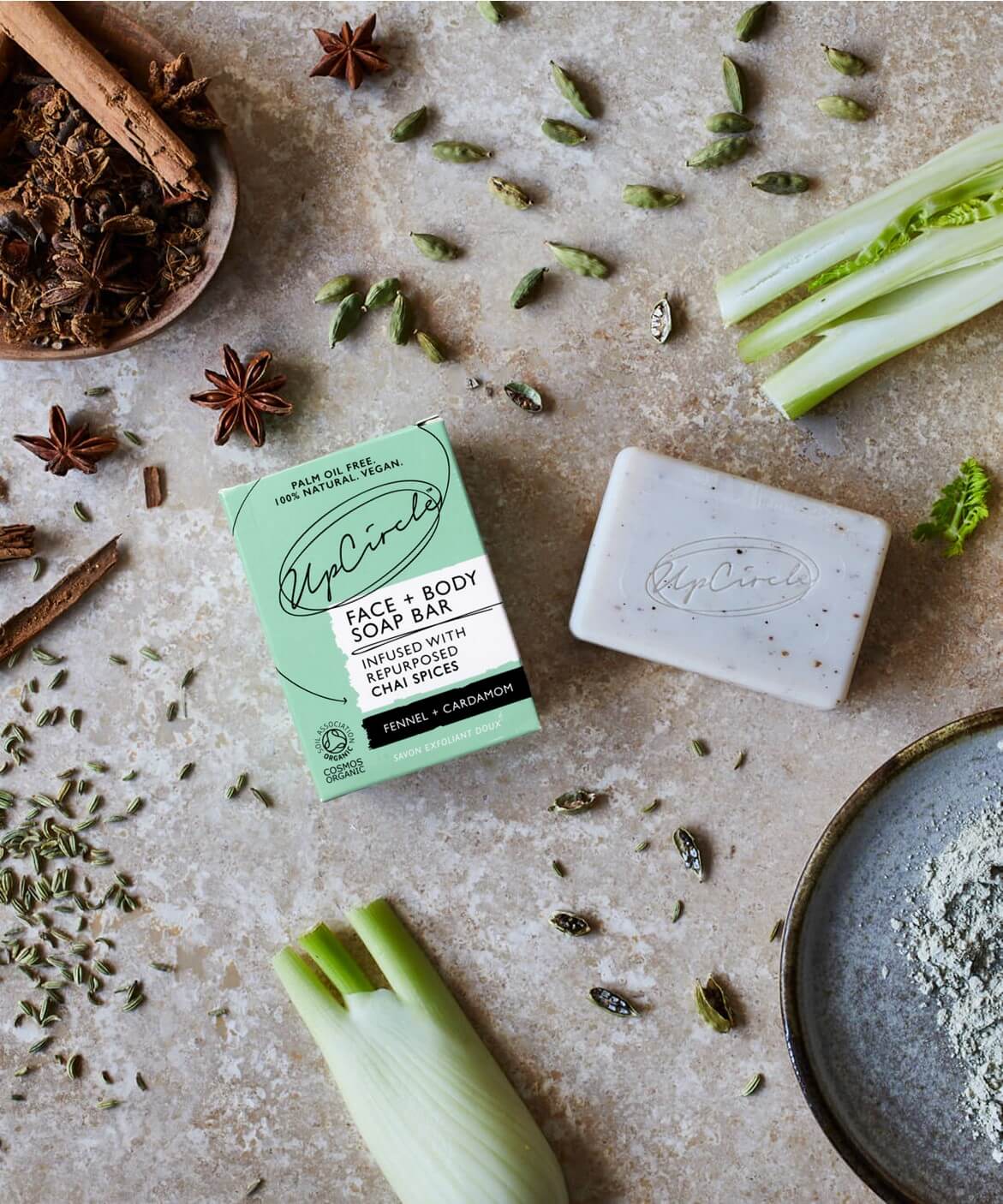 UpCircle Fennel & Cardamom Chai Soap Bar with natural ingredients, showcasing its creamy texture and earthy colors.