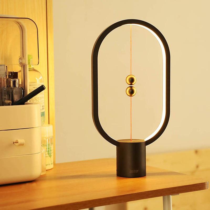 Upgrade HENGPRO Balance Night Light, a portable ellipse-shaped LED lamp with a magnetic mid-air switch, perfect for home decor.