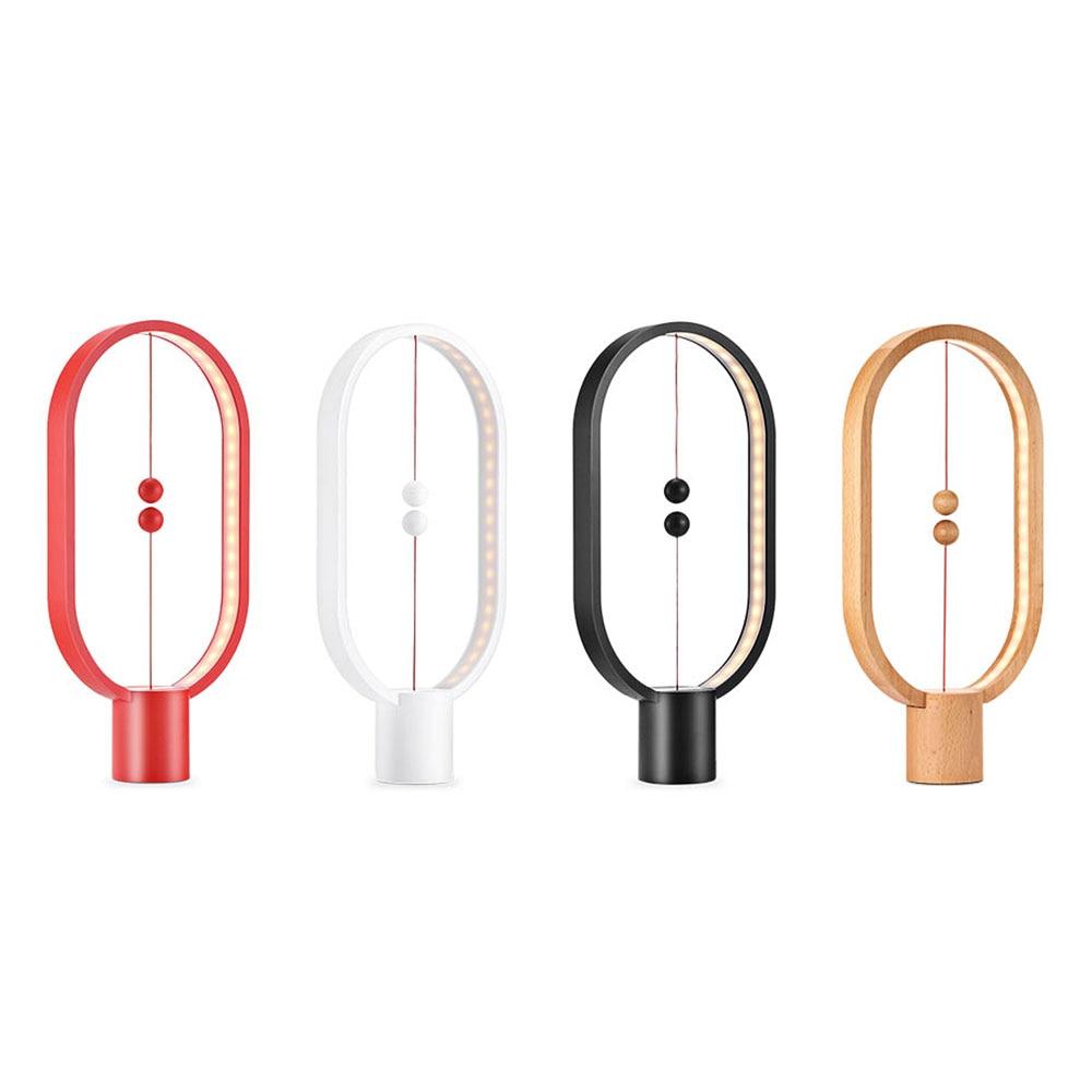 Upgrade HENGPRO Balance Night Light, a portable ellipse-shaped LED lamp with a magnetic mid-air switch, perfect for home decor.