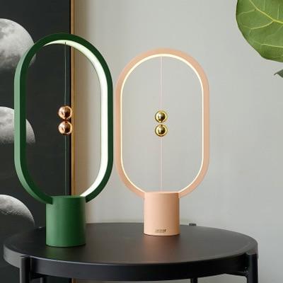 Upgrade HENGPRO Balance Night Light, a portable ellipse-shaped LED lamp with a magnetic mid-air switch, perfect for home decor.