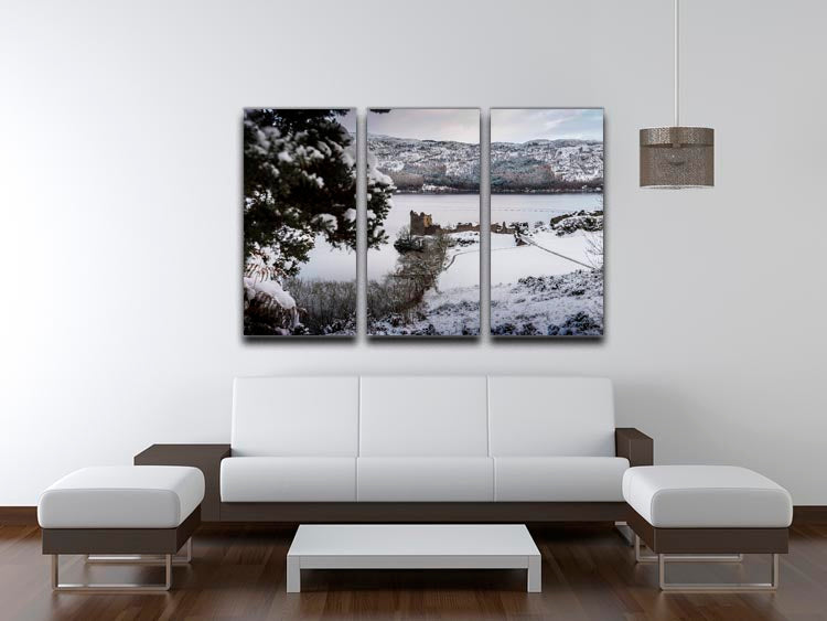A beautiful 3-panel canvas print featuring Urquhart Castle surrounded by snow, showcasing stunning details and vibrant colors.