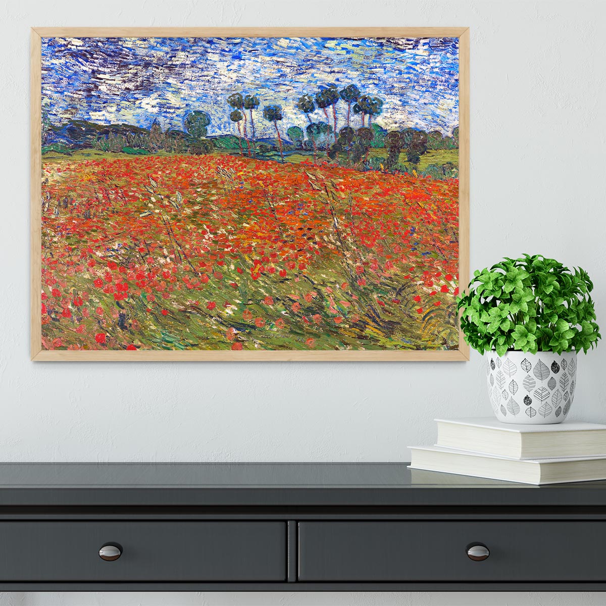 Framed print of Van Gogh's Poppies Field, showcasing vibrant colors and intricate details in a stylish frame.
