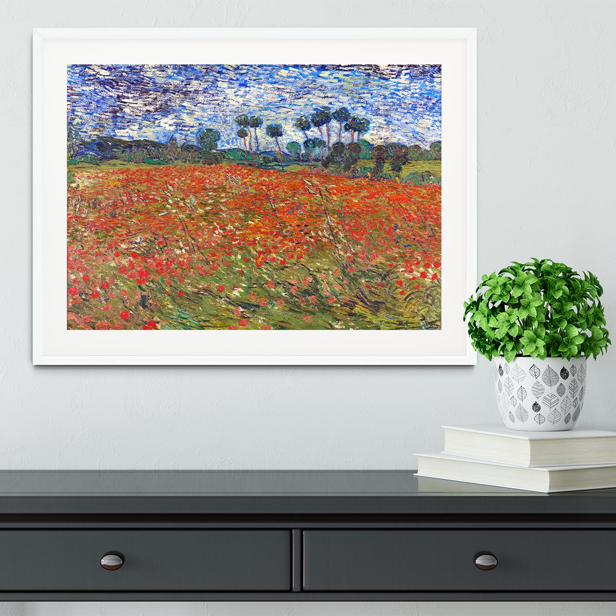 Framed print of Van Gogh's Poppies Field, showcasing vibrant colors and intricate details in a stylish frame.