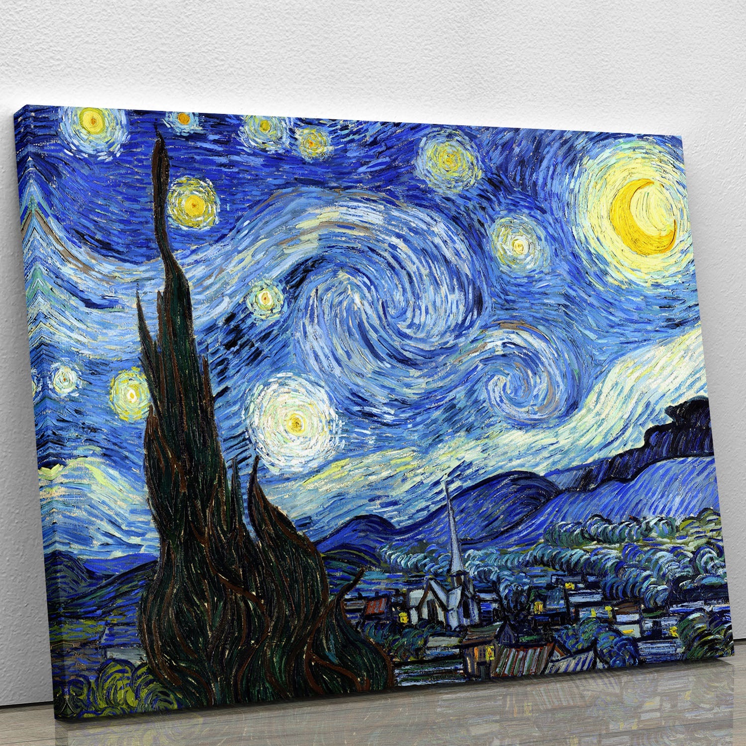 A vibrant canvas print of Van Gogh's Starry Night, showcasing swirling blue skies and bright yellow stars, perfect for home decor.
