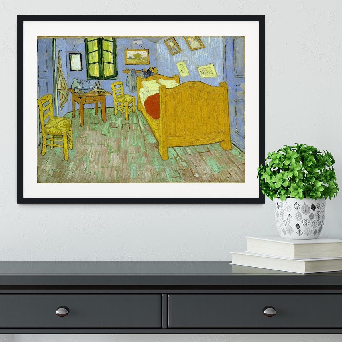 Framed print of Van Gogh's Vincent's Bedroom, showcasing vibrant colors and quality craftsmanship.