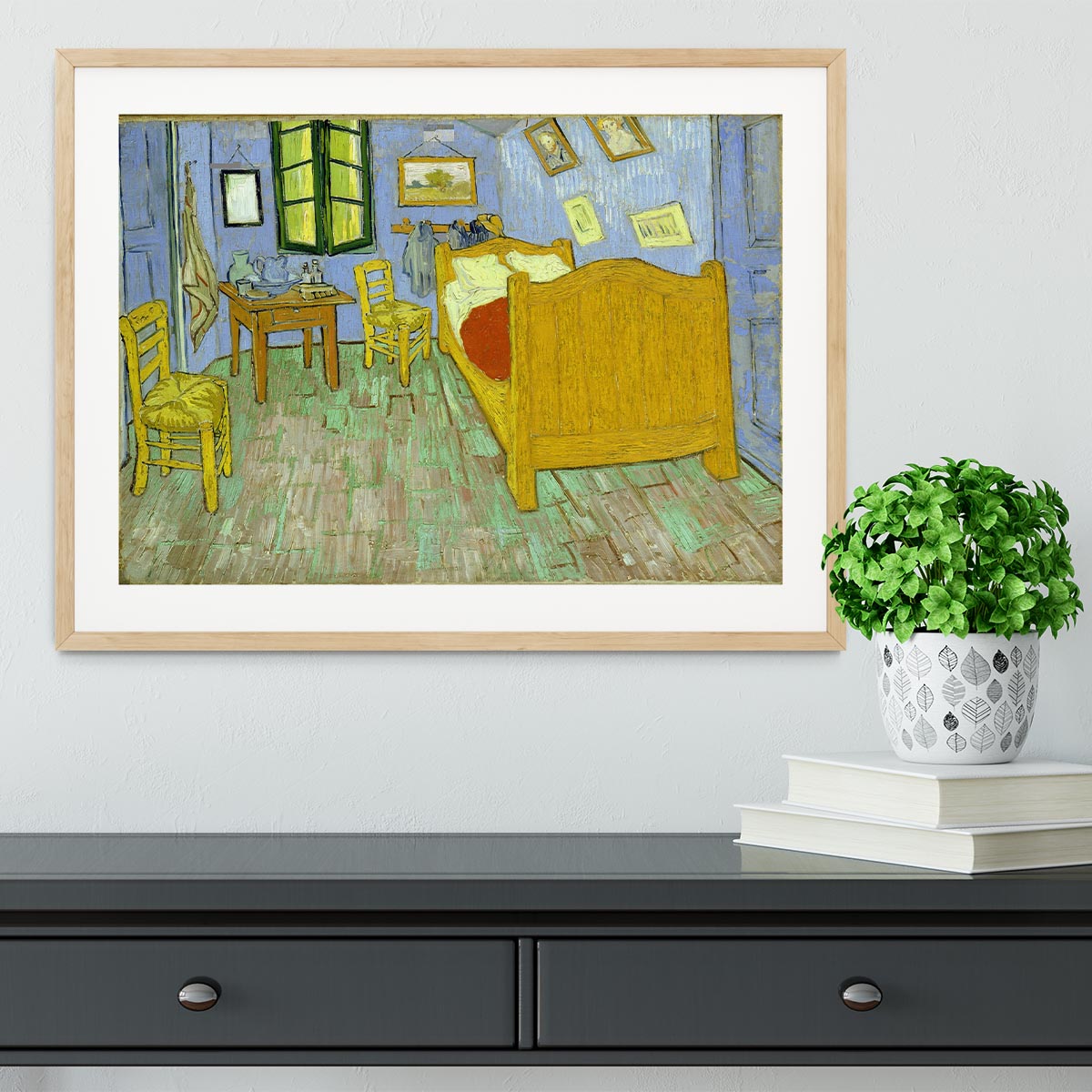 Framed print of Van Gogh's Vincent's Bedroom, showcasing vibrant colors and quality craftsmanship.