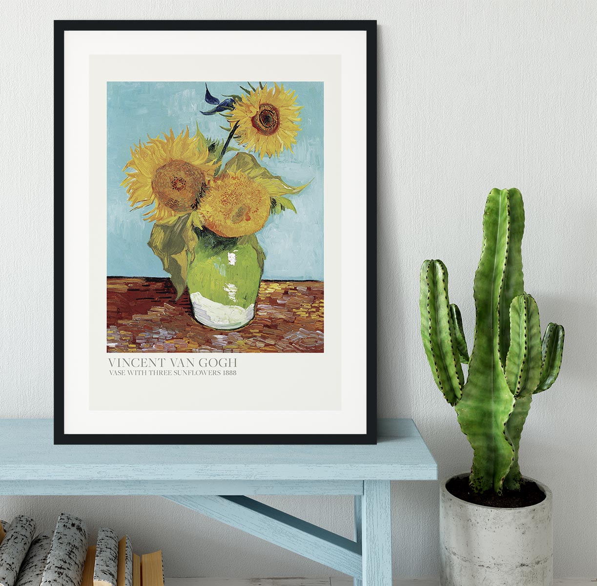 A beautifully framed print of a vase with three vibrant sunflowers, showcasing vivid colors and quality craftsmanship.