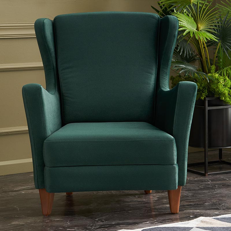 Velvet Armchair LORD in Dark Green, showcasing plush upholstery and elegant design with natural beech wood legs.