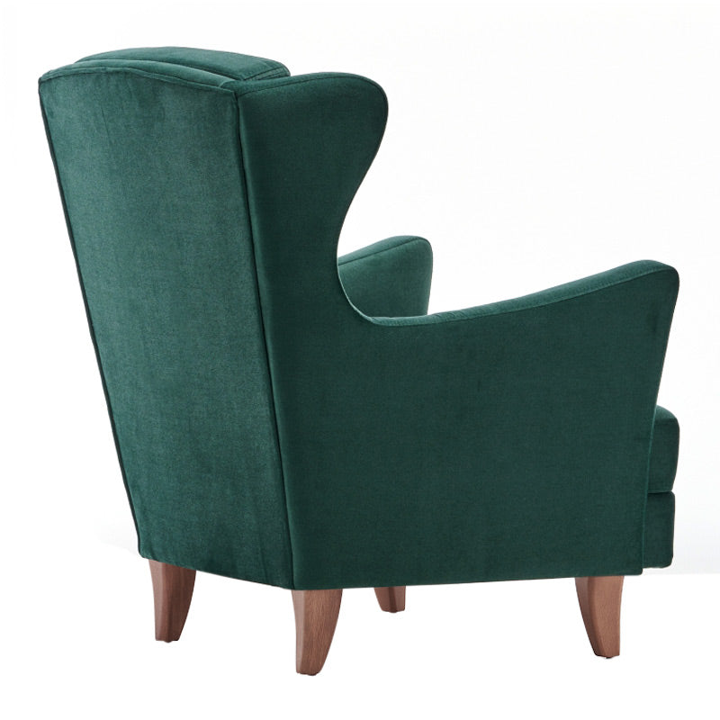 Velvet Armchair LORD in Dark Green, showcasing plush upholstery and elegant design with natural beech wood legs.