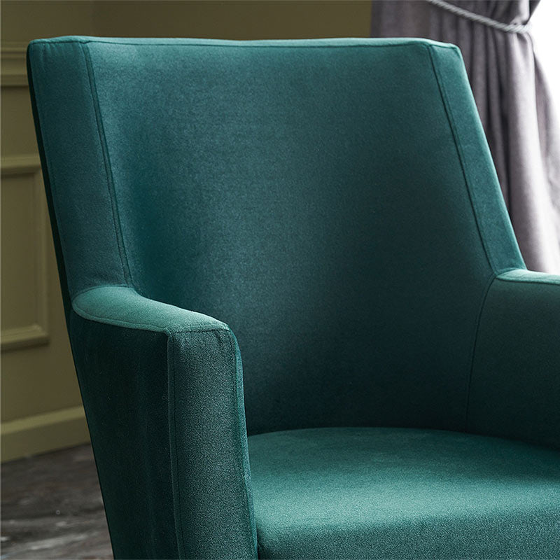REGATA Dark Green Velvet Armchair with natural beech wood legs, plush upholstery, and elegant design, perfect for home or office use.