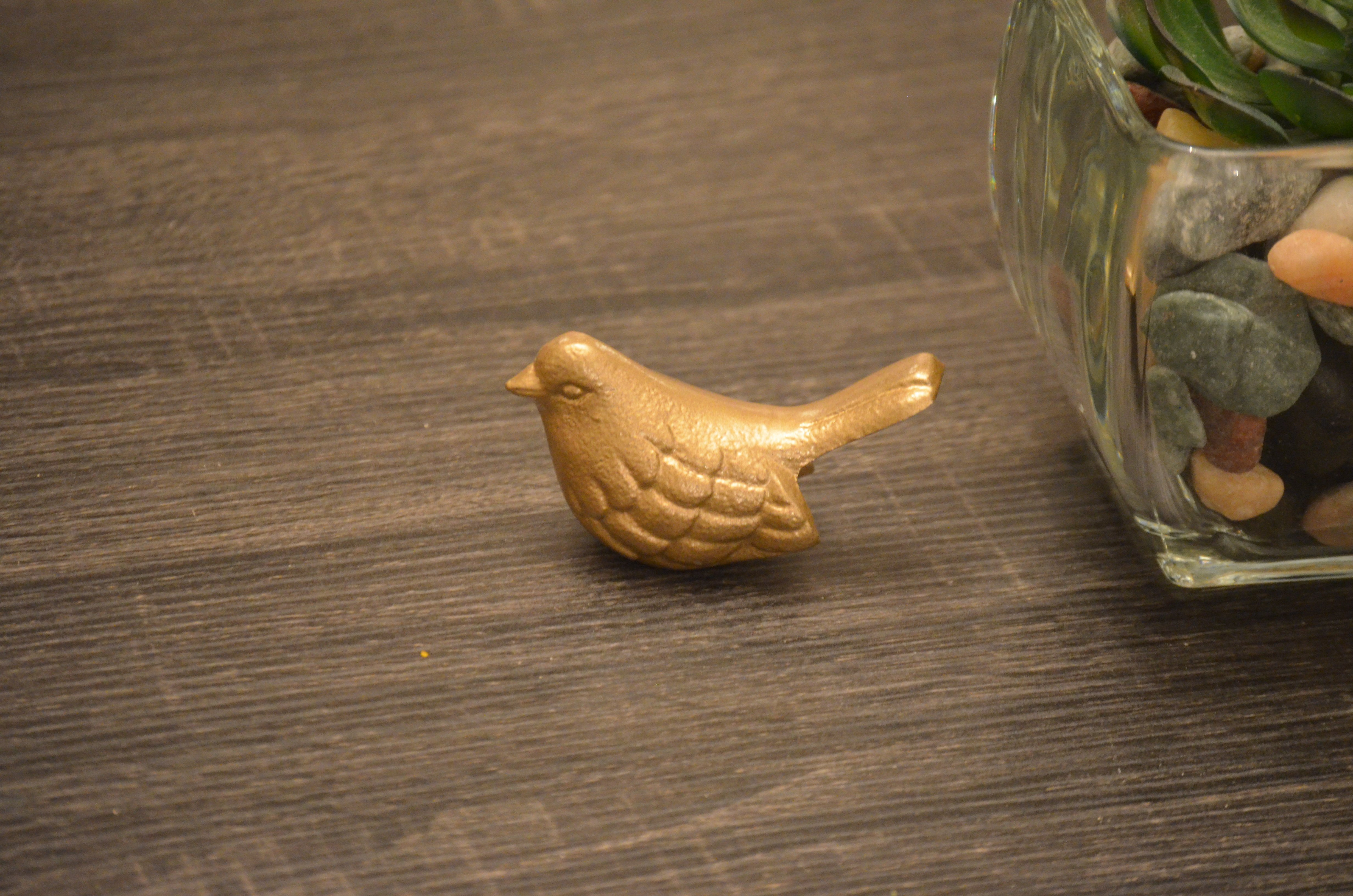 Handcrafted Vibhsa Bird Figurines in marigold color, symbolizing health and happiness, made of aluminum.